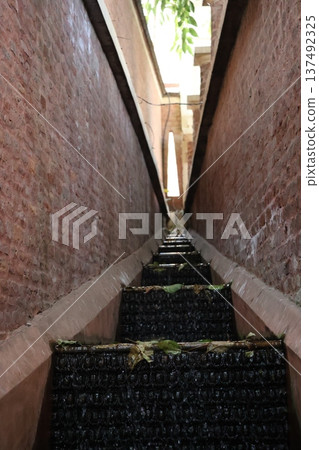 Brick wall and waterway scenery Brick wall and waterway scenery 137492325