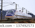 The E8 series train speeds along The E8 series train speeds along 137492573