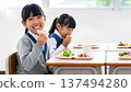 Children enjoying a healthy school lunch at a Japanese elementary school 137494280