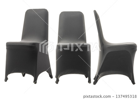 Set of black spandex chair covers shown from three different angles view. These stretchable polyester covers are ideal for wedding banquets, formal events isolated on a white background 137495318