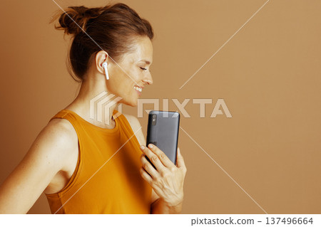 Peaceful Woman Listening to Audio Peaceful Woman Listening to Audio 137496664