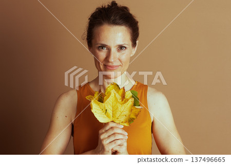 Gentle Smile with Autumn Foliage 137496665
