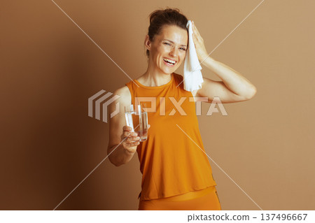 Laughing Woman: Post-Workout Refreshment and Joy Laughing Woman: Post-Workout Refreshment and Joy 137496667