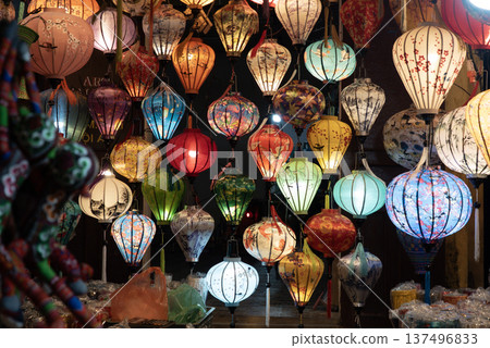 Colorful lanterns glowing at night in Hoi An, Vietnam traditional lantern festival street lights Colorful lanterns glowing at night in Hoi An, Vietnam traditional lantern festival street lights 137496833