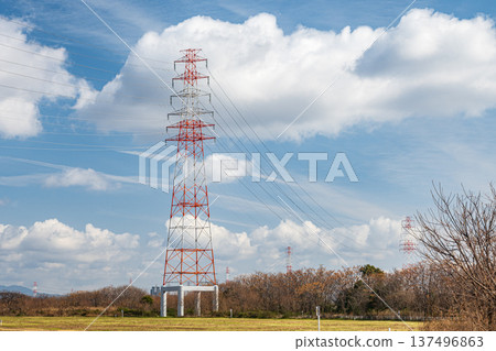 Power line tower standing on the riverbed of Takatsuki City, right bank of the Yodo River, Osaka Prefecture 137496863