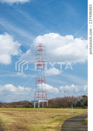 Power line tower standing on the riverbed of Takatsuki City, right bank of the Yodo River, Osaka Prefecture 137496865