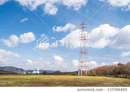 Power line tower standing on the riverbed of Takatsuki City, right bank of the Yodo River, Osaka Prefecture 137496869