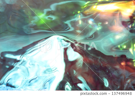 Vibrant abstract colors swirl across a glossy surface with luminous greens, blues, and reds 137496948