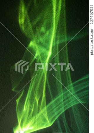 Abstract green laser light beams and shapes for futuristic tech or party background 137497035