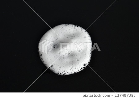 Foam from soap or shampoo. 137497385