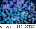 Abstract bokeh lights in blue, green, and purple tones creating a vibrant festive ambiance 137497585