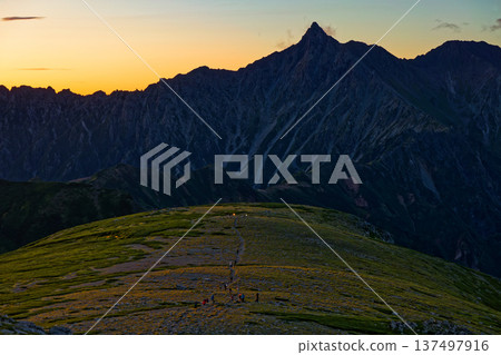 Northern Alps and Mount Yari at dawn as seen from Mount Sugoroku 137497916