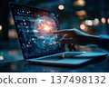 Hand reaches toward digital brain on laptop screen, a futuristic AI interface and innovation 137498132
