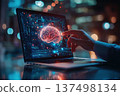 Futuristic brain interface depicted on a laptop screen highlighting digital neural network concept 137498134