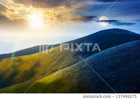 mountain landscape in summer. day and night time change concept. beautiful travel background with rolling hills. lush green grassy hillside with sun and moon dappled light. astrology wallpaper 137498275