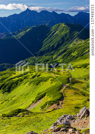 Mount Sugoroku and the Yari-Hotaka mountain range seen from Mount Mitsumatarenge in the Northern Alps Mount Sugoroku and the Yari-Hotaka mountain range seen from Mount Mitsumatarenge in the Northern Alps 137498353