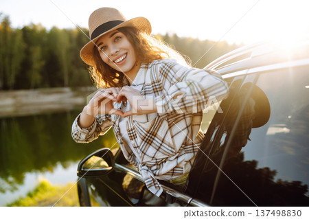 Road trip travel, woman and car window freedom to relax in summer, outdoor adventure. Active life. Road trip travel, woman and car window freedom to relax in summer, outdoor adventure. Active life. 137498830