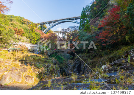 Takachiho Town, Miyazaki Prefecture in autumn: Takachiho Gorge with autumn leaves, Takachiho Three Bridges Takachiho Town, Miyazaki Prefecture in autumn: Takachiho Gorge with autumn leaves, Takachiho Three Bridges 137499557