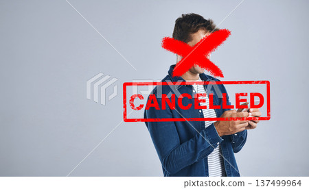Cancel culture, man phone and banned overlay with graphic and red cross in studio. Social media, grey background and cancelled person with controversy, toxic opinion and censorship on mobile app 137499964