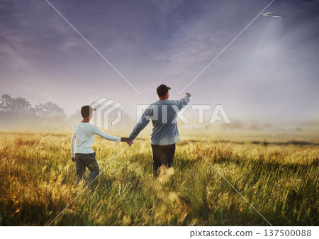 Back, alien and flying spaceship with a family outdoor in nature together during invasion or ufo discovery. Universe, earth and people in the countryside to search for proof of extraterrestrial life Back, alien and flying spaceship with a family outdoor in nature together during invasion or ufo discovery. Universe, earth and people in the countryside to search for proof of extraterrestrial life 137500088