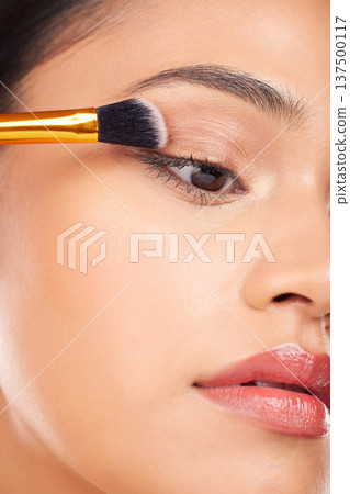 Face makeup, eyeshadow brush and woman with studio cosmetics tools, beauty care product and closeup facial cosmetology. Foundation application, spa salon dermatology and aesthetic skincare model Face makeup, eyeshadow brush and woman with studio cosmetics tools, beauty care product and closeup facial cosmetology. Foundation application, spa salon dermatology and aesthetic skincare model 137500117