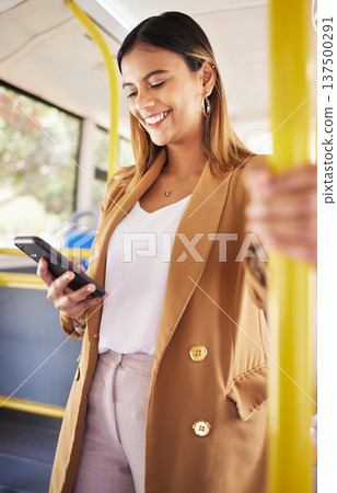Bus, woman and phone with public transport, social media scroll and smile with business commute. City travel, stop and internet app of a female professional on a mobile with networking on metro Bus, woman and phone with public transport, social media scroll and smile with business commute. City travel, stop and internet app of a female professional on a mobile with networking on metro 137500291
