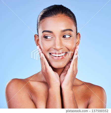 Beauty, health and skincare with face of woman in studio for cosmetics, dermatology and facial. Glow, self care and wellness with person on blue background for spa treatment, grooming and makeup Beauty, health and skincare with face of woman in studio for cosmetics, dermatology and facial. Glow, self care and wellness with person on blue background for spa treatment, grooming and makeup 137500352