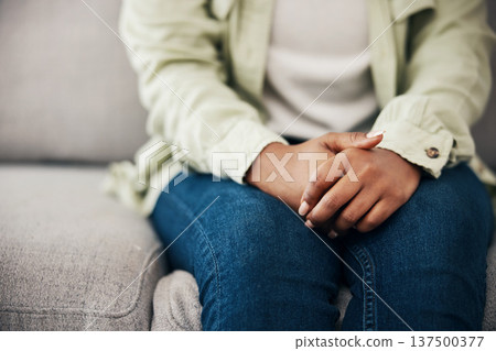 Stress, hands and woman on a sofa with depression after news of cancer or diagnosis in her home. Anxiety, zoom and female with mental health crisis for infertility results, disaster or mistake fail Stress, hands and woman on a sofa with depression after news of cancer or diagnosis in her home. Anxiety, zoom and female with mental health crisis for infertility results, disaster or mistake fail 137500377