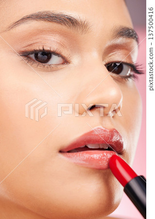 Beauty, makeup and portrait of woman with lipstick for cosmetics, skincare products and salon. Luxury, fashion aesthetic and face zoom of person in studio background for cosmetology, glamour or gloss 137500416