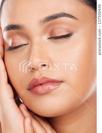 Beauty, makeup and product with face of woman in studio for cosmetics, glow and self care. Health, skincare and dermatology treatment with person on background for facial, salon and cosmetology 137500426