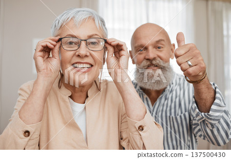 Senior couple, portrait and video call in home for communication, virtual connection and conversation. Elderly people, happy and online chat in living room with network, internet and hands for talk 137500430