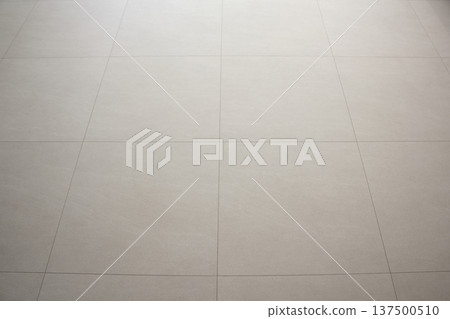 The living room has a beige hardwood floor. 137500510