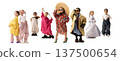 Group of children wearing oversized fashion outfits posing confidently, symbolizing creativity, childhood imagination 137500654
