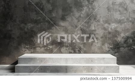 A concrete step is positioned in front of a solid concrete wall, creating a stark urban scene. 137500994
