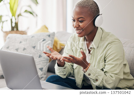 Laptop, video call or black woman in headphones for remote work, conversation or online research at home. Smile, podcast or happy journalist working on computer or streaming music on social media Laptop, video call or black woman in headphones for remote work, conversation or online research at home. Smile, podcast or happy journalist working on computer or streaming music on social media 137501042