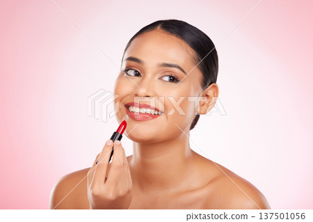Lipstick, mockup and face of happy woman with makeup or cosmetics on pink background space and thinking about product. Lips, beauty and model with ideas for skincare or choice of red color on mouth Lipstick, mockup and face of happy woman with makeup or cosmetics on pink background space and thinking about product. Lips, beauty and model with ideas for skincare or choice of red color on mouth 137501056
