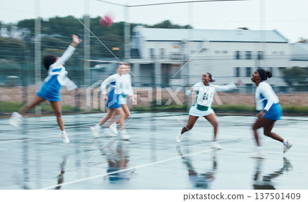 Sports, netball team player and women running, cardio or challenge for ball, competition and play active game. Motion blur, outdoor tournament and group workout, exercise and player training together Sports, netball team player and women running, cardio or challenge for ball, competition and play active game. Motion blur, outdoor tournament and group workout, exercise and player training together 137501409
