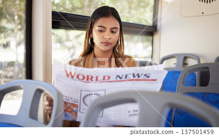 Woman, bus and transport, reading newspaper and travel with commute to work or college, city and traffic. Transportation, vehicle and student, day trip and newsletter with metro and public service 137501459