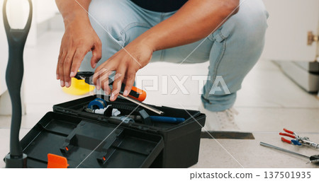 Repair, maintenance and man with box of tools for home construction, fixing and kitchen plumbing. Manual labor, DIY plumber and handyman pack equipment after working on sewer pipe, sink and faucet 137501935