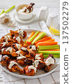 Alabama white sauce chicken wings with vegetables 137502279
