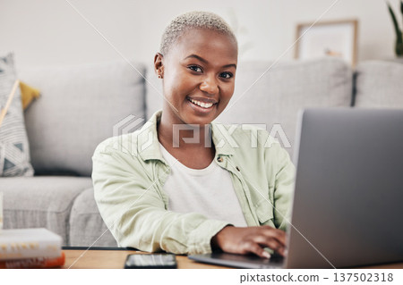 House, portrait or happy woman typing on laptop for communication, social media or online dating. Smile, remote work or African person with technology to scroll on website or digital network at home 137502318