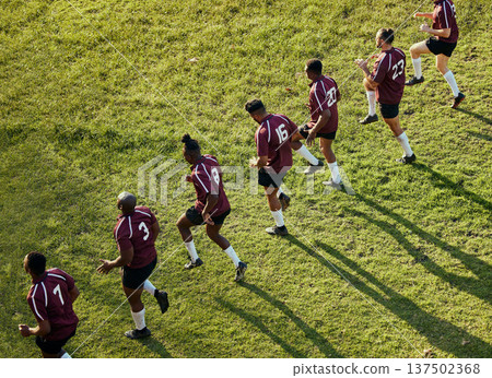 Sports, team and men in field for training, workout and exercise on grass for rugby competition. Fitness, collaboration and line of athletes stretching for practice, match and game or challenge Sports, team and men in field for training, workout and exercise on grass for rugby competition. Fitness, collaboration and line of athletes stretching for practice, match and game or challenge 137502368