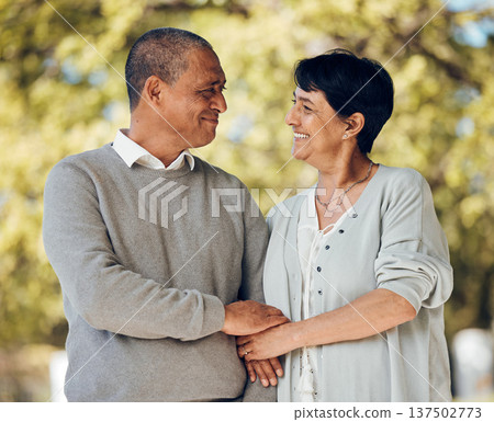 Mature couple in park, love and smile, support and trust with bonding and marriage. Life partner, retirement together and romance, people are happy outdoor with healthy relationship and care Mature couple in park, love and smile, support and trust with bonding and marriage. Life partner, retirement together and romance, people are happy outdoor with healthy relationship and care 137502773