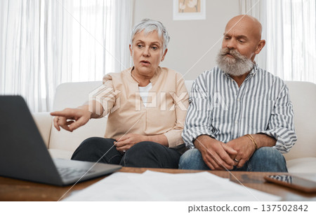 Budget, finance and senior couple with laptop planning financial investments, mortgage or tax papers. Elderly woman apeaking of bills, debt and pension fund on bank statement with an old man at home Budget, finance and senior couple with laptop planning financial investments, mortgage or tax papers. Elderly woman apeaking of bills, debt and pension fund on bank statement with an old man at home 137502842