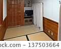 A private room in a wooden school building, renovated from a former night watch room, with tatami mats and wooden walls that bring back memories 137503664