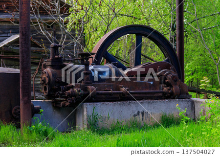 Old steaming threshing machine in Open air Museum of Folk Architecture and Folkways of Middle Naddnipryanschina in Pereyaslav, Ukraine Old steaming threshing machine in Open air Museum of Folk Architecture and Folkways of Middle Naddnipryanschina in Pereyaslav, Ukraine 137504027