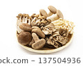 Assorted mushrooms in a colander Assorted mushrooms in a colander 137504936