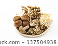 Assorted mushrooms in a colander Assorted mushrooms in a colander 137504938
