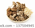 Assorted mushrooms in a colander Assorted mushrooms in a colander 137504945