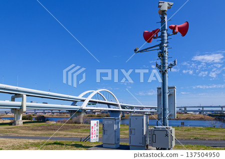 Arakawa embankment disaster prevention administrative radio chime and blue sky Goshiki Sakura Ohashi Ekita junction Arakawa embankment disaster prevention administrative radio chime and blue sky Goshiki Sakura Ohashi Ekita junction 137504950